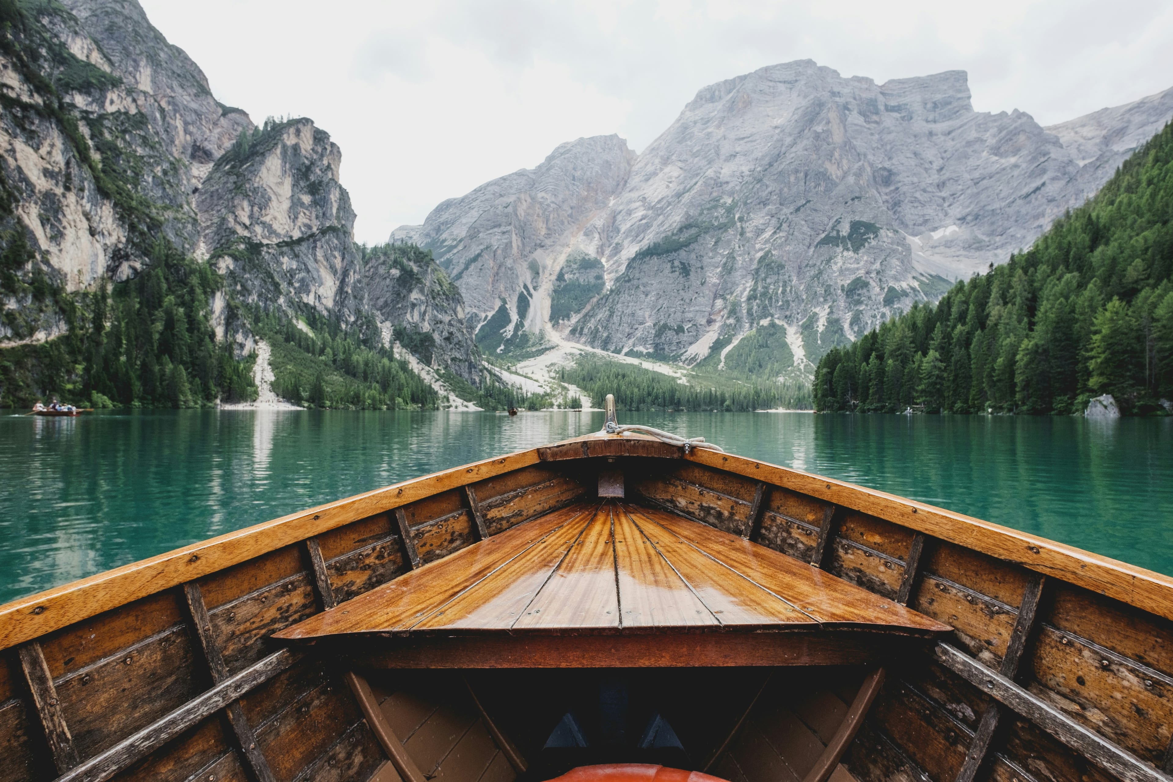 A bright alpine lake and green mountains